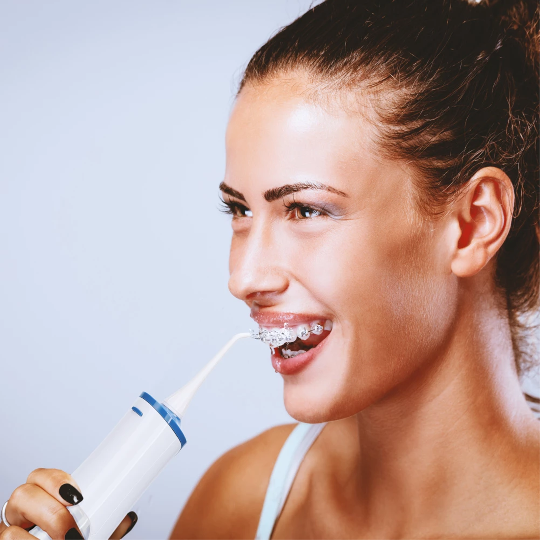 Electric Toothbrush and Water Flosser Kit by Perfect smile